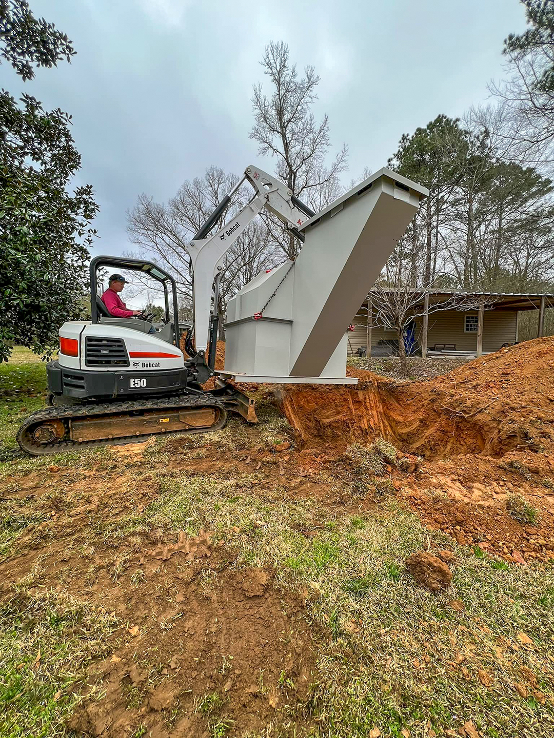 Surge-A-Trol septic tank installation in a yard
